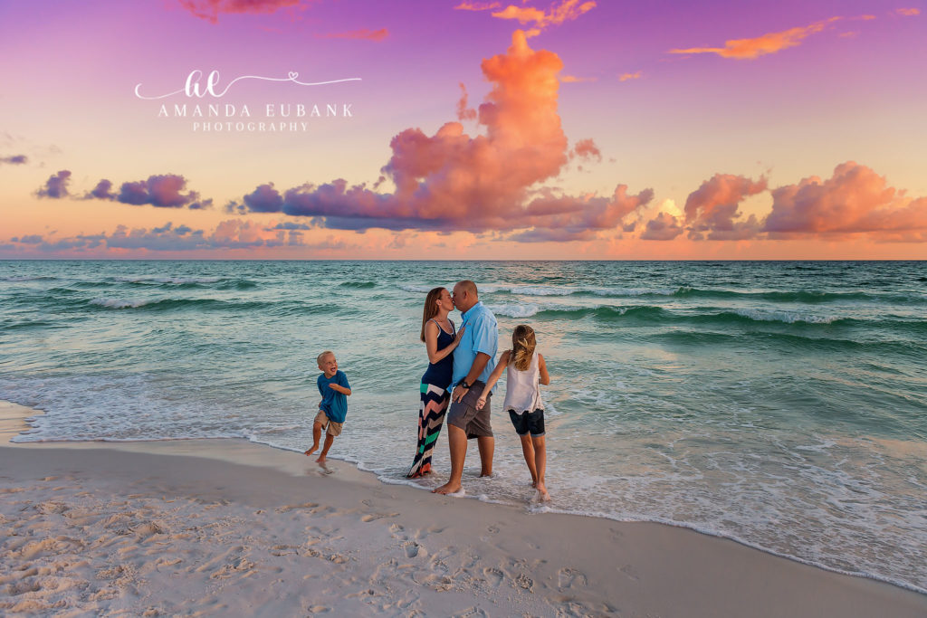 Sunset beach favorite portrait 103 along Florida's Emerald Coast featuring family candid in navy and white classic