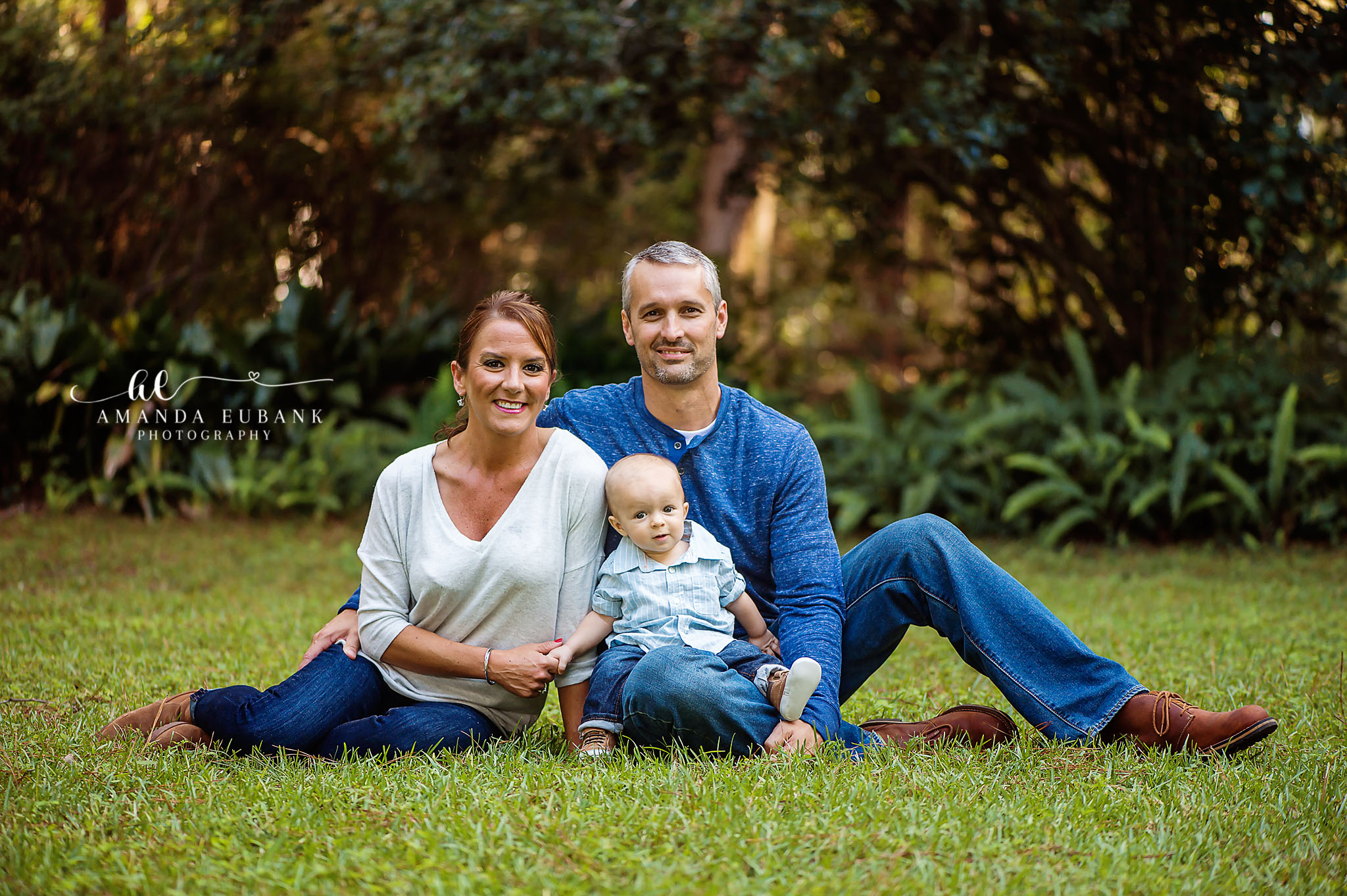 Eden Garden Photographer Family portrait in front of the historic brick column at Eden Gardens Wesley House