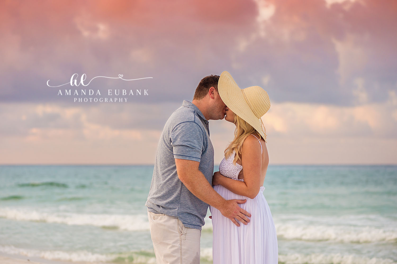 Blue Mountain Beach Florida Maternity Photographer | 30A Beach Maternity Photography Blue Mountain Beach Florida maternity photographer captures expecting couple kissing on beach at pastel sunset