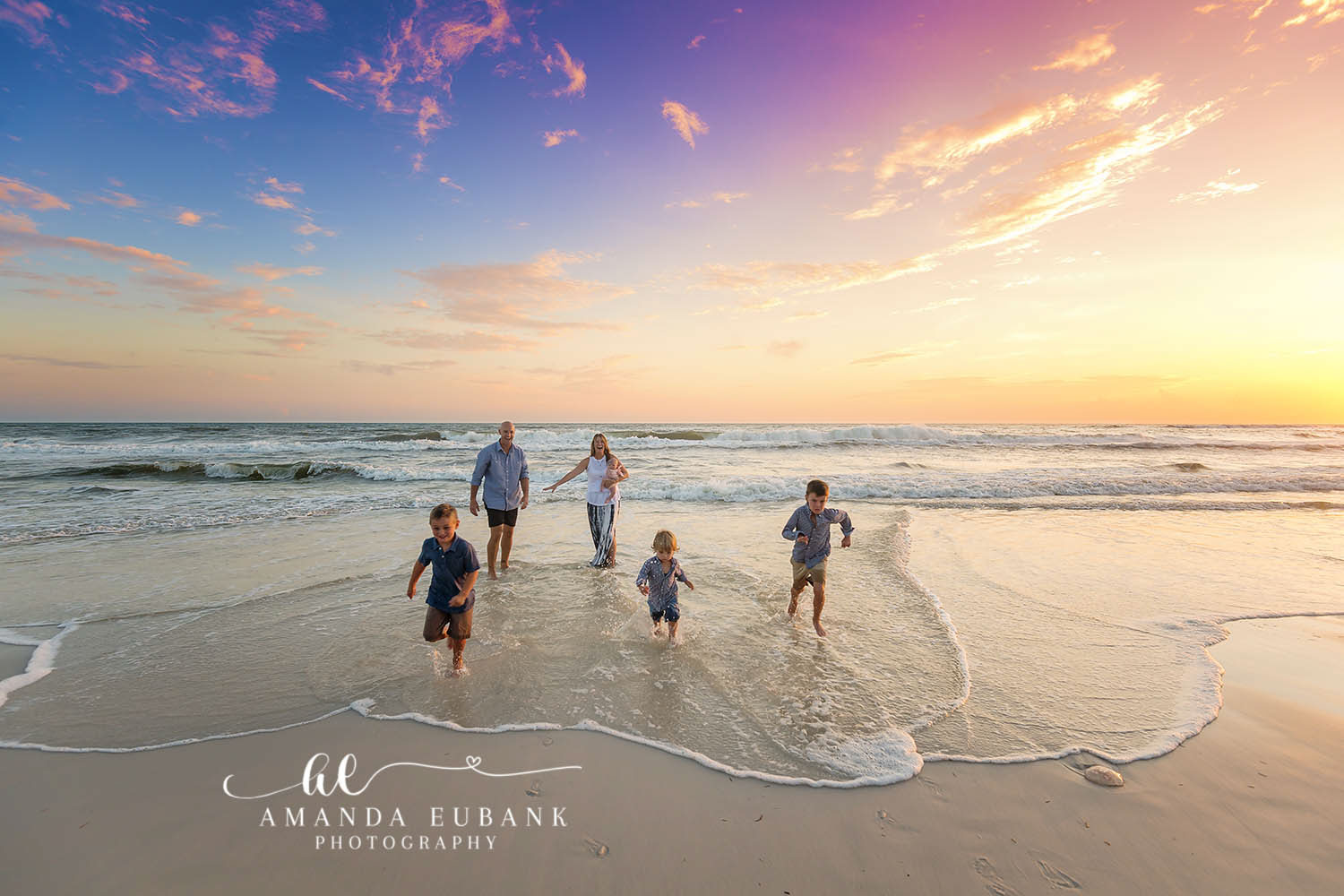 Sandestin Florida Family Photographer | 30A Beach Family Photography Sandestin Florida family photographer captures family of five running through the surf at sunset