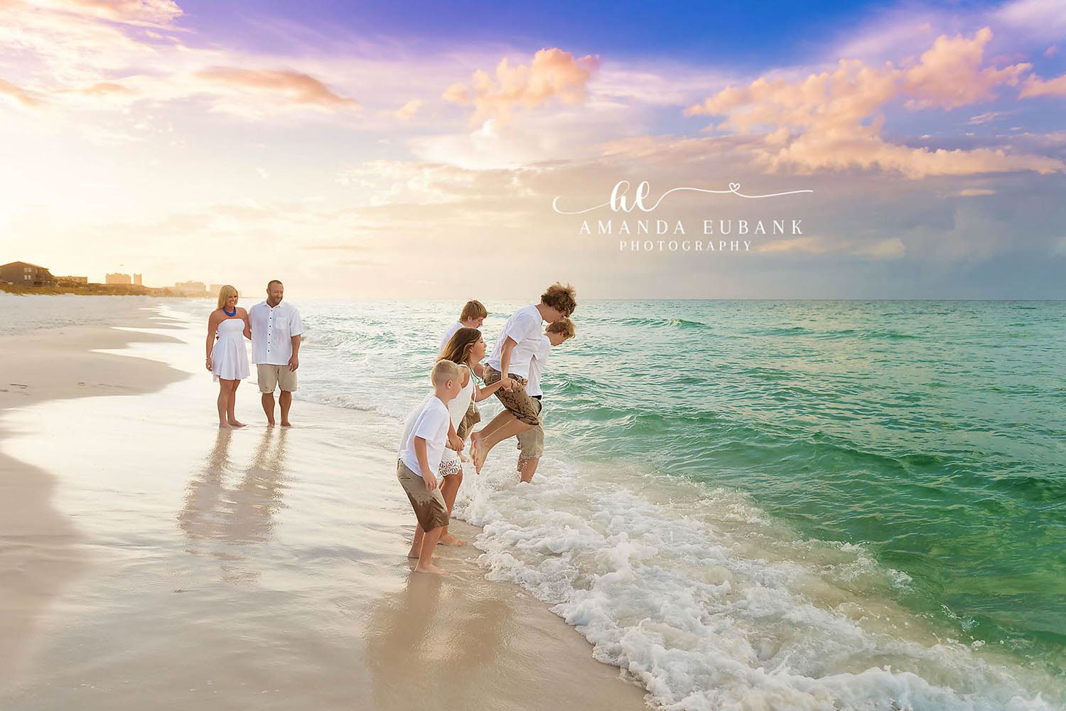 Seagrove Beach Florida Engagement Photographer | 30A Beach Photography Family playing together in the turquoise Gulf surf at sunset during a beach session in Seagrove Beach, Florida along 30A