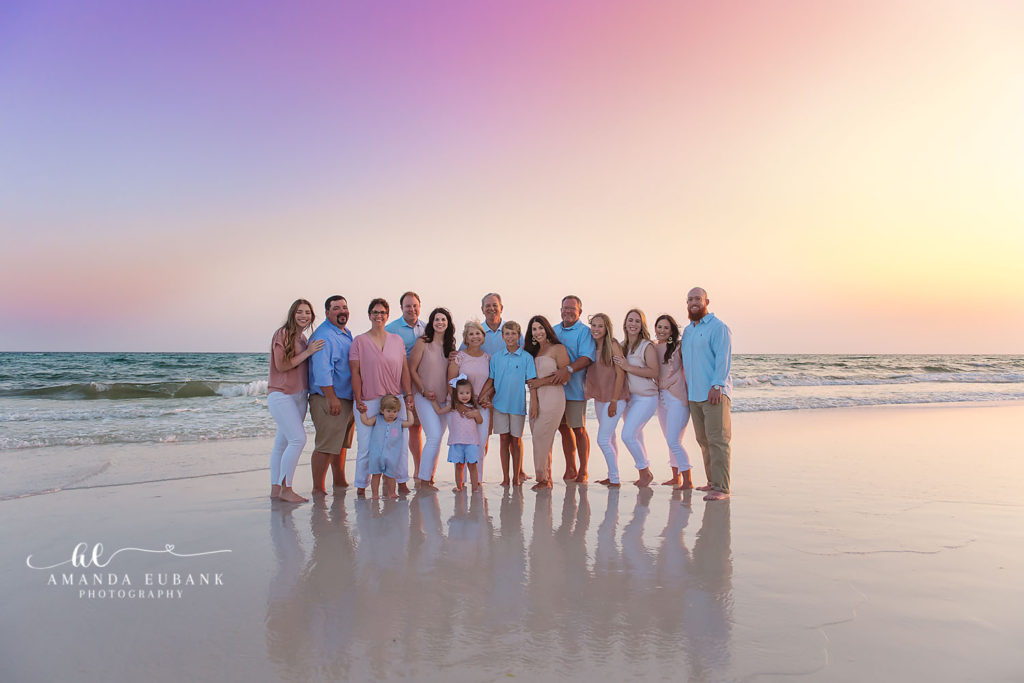 Grandparents celebrating their 50th wedding anniversary with their kids and grandkids