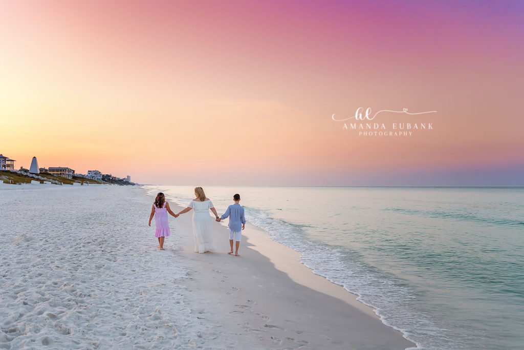 Johnson parents sharing a quiet moment as the sun rises over the gulf