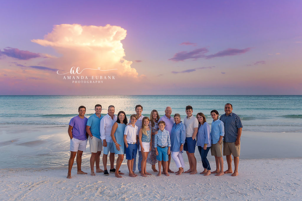 Extended Compton family gathered together on Watercolor Beach at sunset