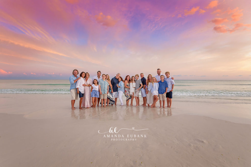 Coastal family portrait of the Hewetts on the 30A beach during golden hour