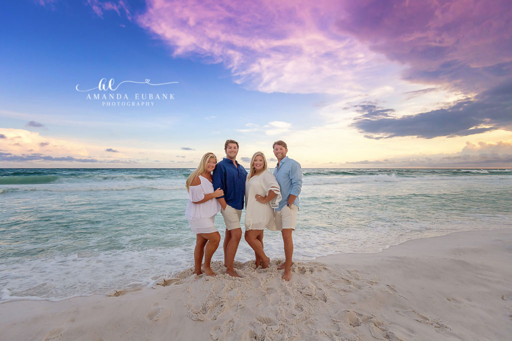 Extended Smith family gathered on the Sandestin shoreline before the surprise proposal