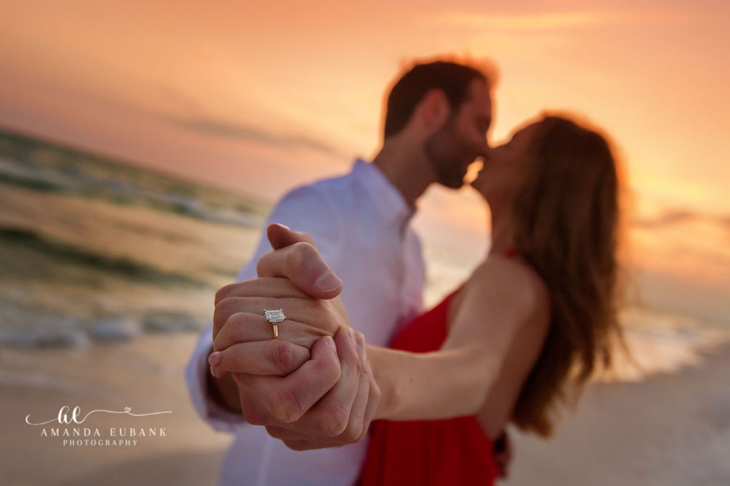 Romantic beach proposal at sunset in Seaside Florida captured by a professional 30A engagement photographer