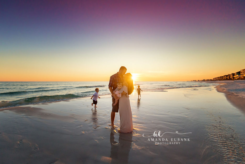 Final sunset frame of the Carter family on the Emerald Coast shoreline