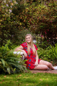 Ansley resting on the classic studio-style steps at Eden Gardens State Park