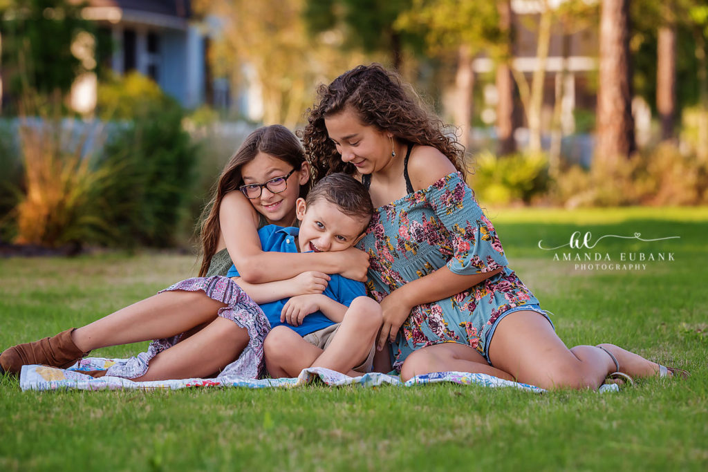 The Eubank kids on a Watersound cottage lane during their lifestyle photo session