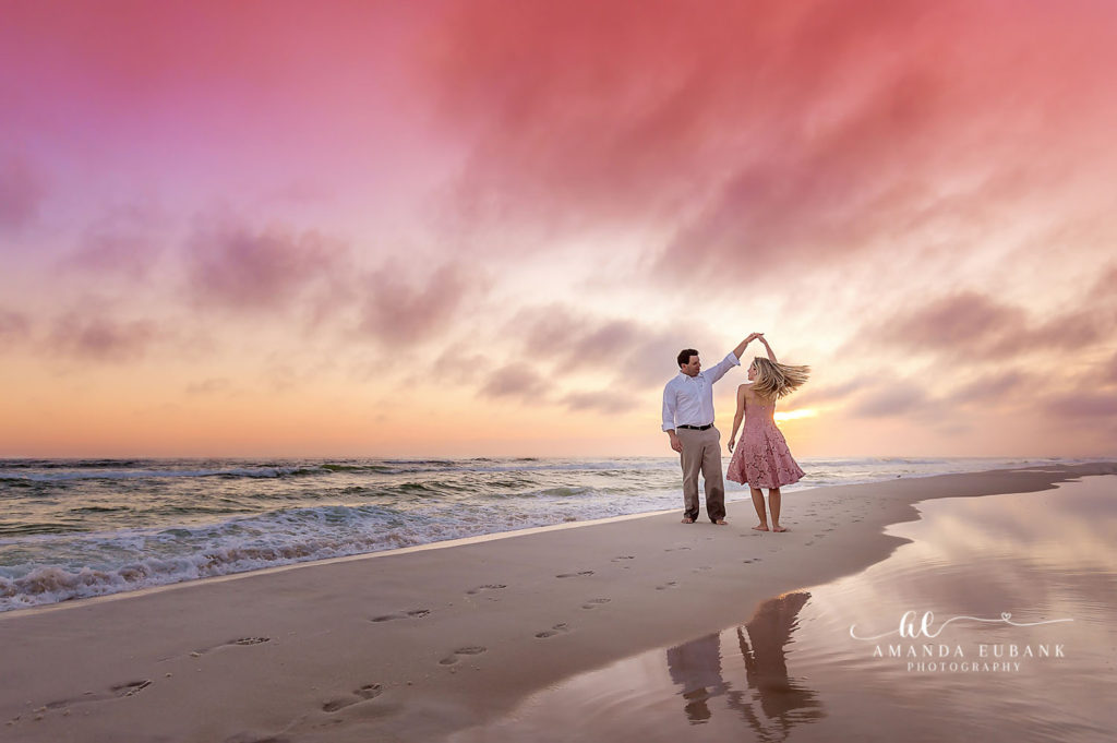 Soft natural light wraps Kara and Chris as they share a peaceful moment on the boardwalk