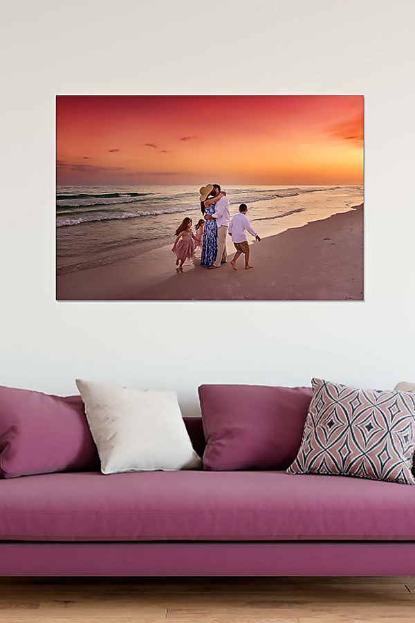 Destin Sunset Family Walk Canvas Mockup — Mauve Sofa Destin sunset family walking the surfline single canvas mockup hung above a mauve velvet sofa with patterned accent pillows