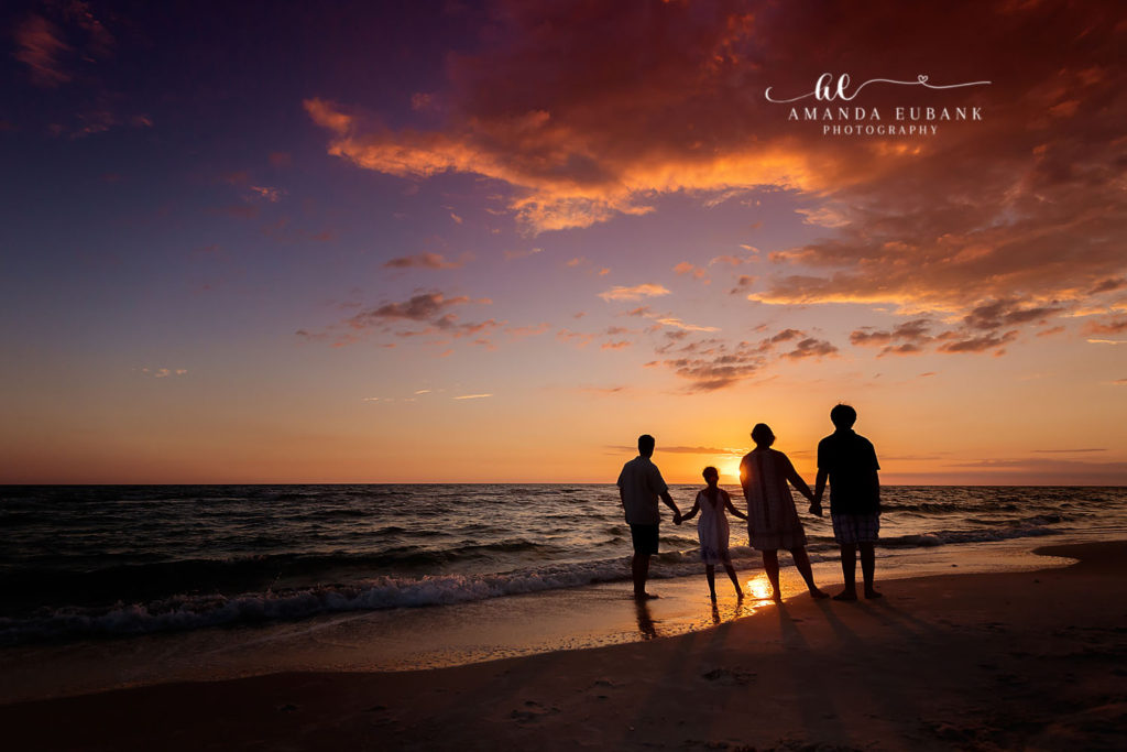 brother and sister sibling portrait session at Cape San Blas beach dunes with beach-glow evening, tender wide horizon framing