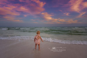 extended family reunion with multiple generations and young family at 30A sunset shoreline with gulf-glow evening, playful low-tide composition