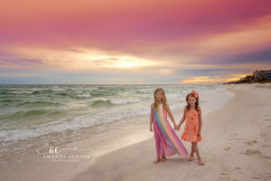 Low-angle shoreline portrait as the DuCotes glow in the last light of the day