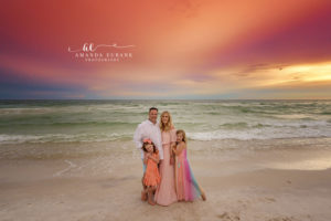 DuCote sisters laughing together at tide-edge twilight on 30A