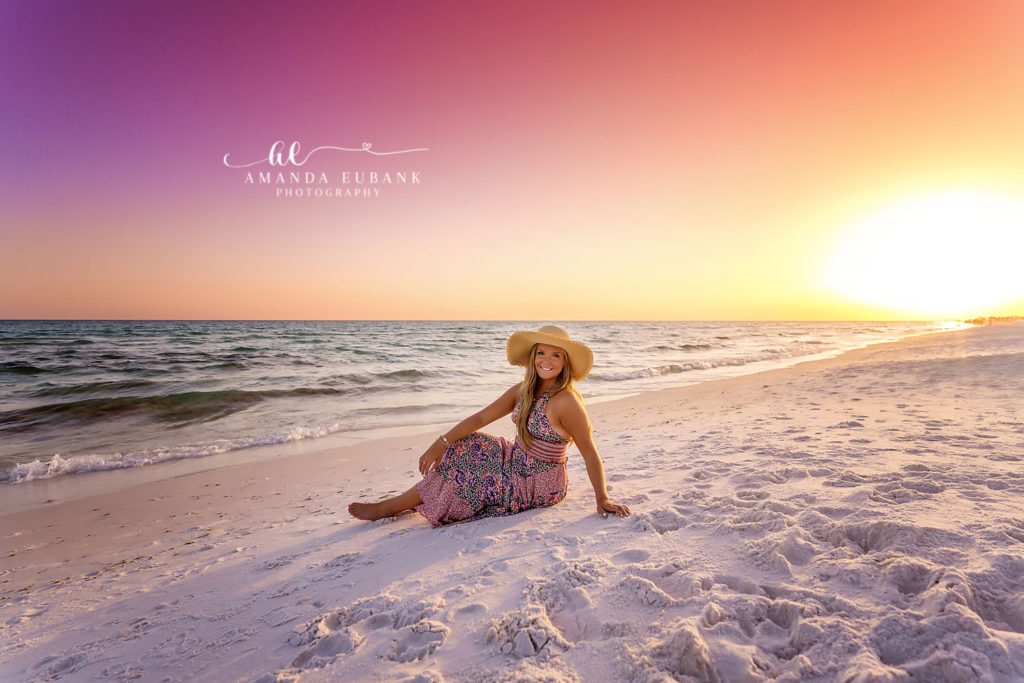 Wading the shoreline as the smocked sundress catches breeze beneath a tangerine sky