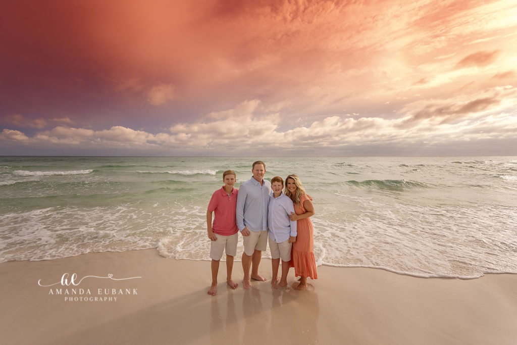 Richards family laughs together on the Santa Rosa Beach sand at sunset