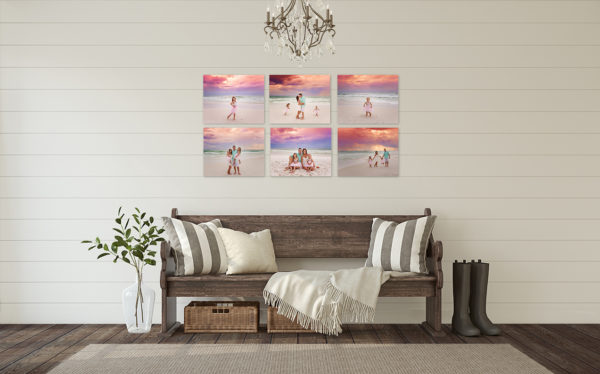 Santa Rosa Beach Photographer — Wall Gallery Mockup A Santa Rosa Beach photographer wall art display showing a coastal foyer wall art mockup featuring six framed beach family prints arranged above a rustic bench beneath a chandelier, warm sunset glow, a quiet pose at the tideline, in a vertical garden frame.