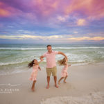 Sunset Carillon Beach Family Portrait — Sunset Frame 107 Three-quarter portrait of grandparents with their family at Carillon Beach on 30A.