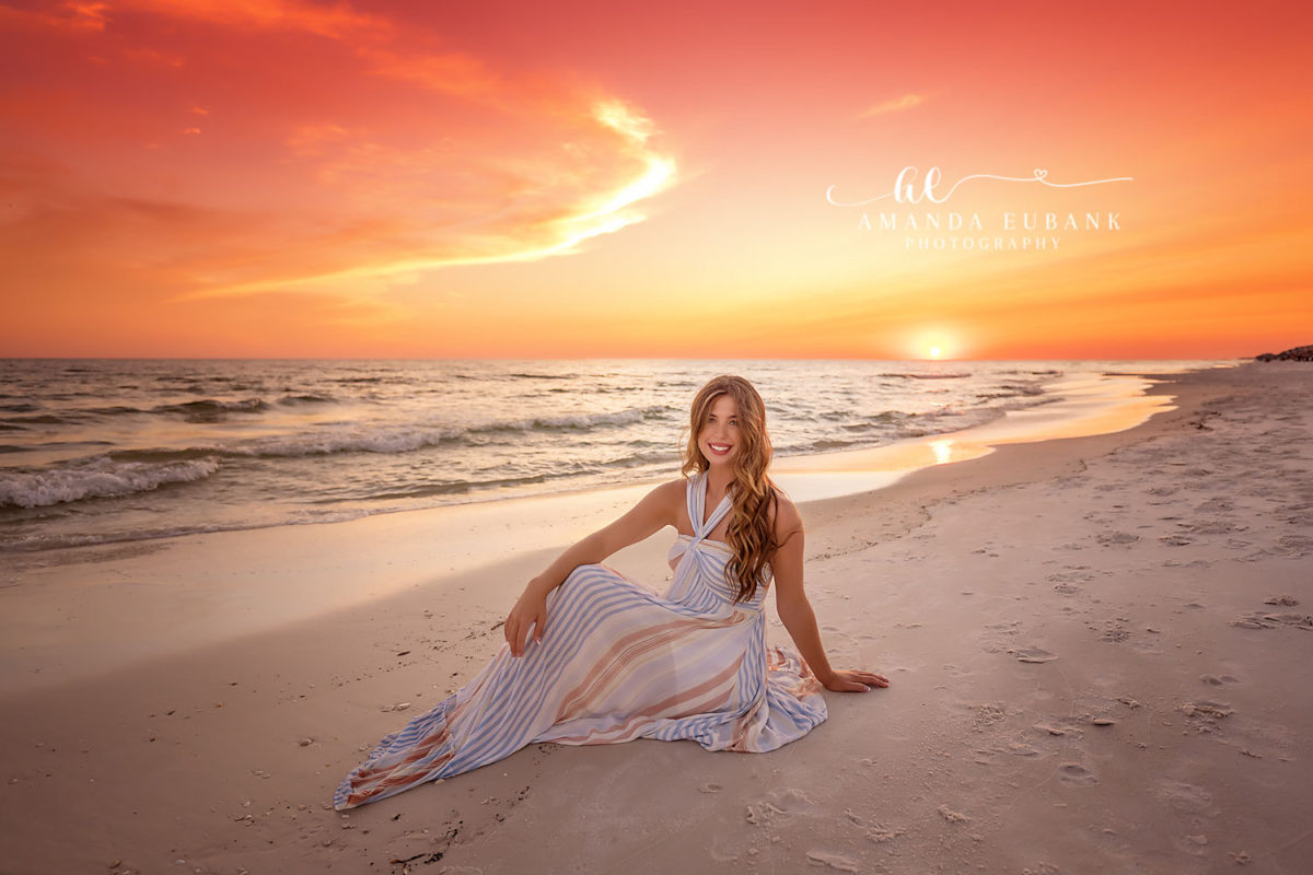 Editorial Rosemary Beach Senior — Shoreline 37 Hannah seated at the Gulf shoreline at sunset during her 30A senior portrait session.