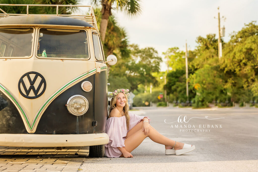 Evelyn laughing beside the Grayton Beach vintage VW van during her sunset session.