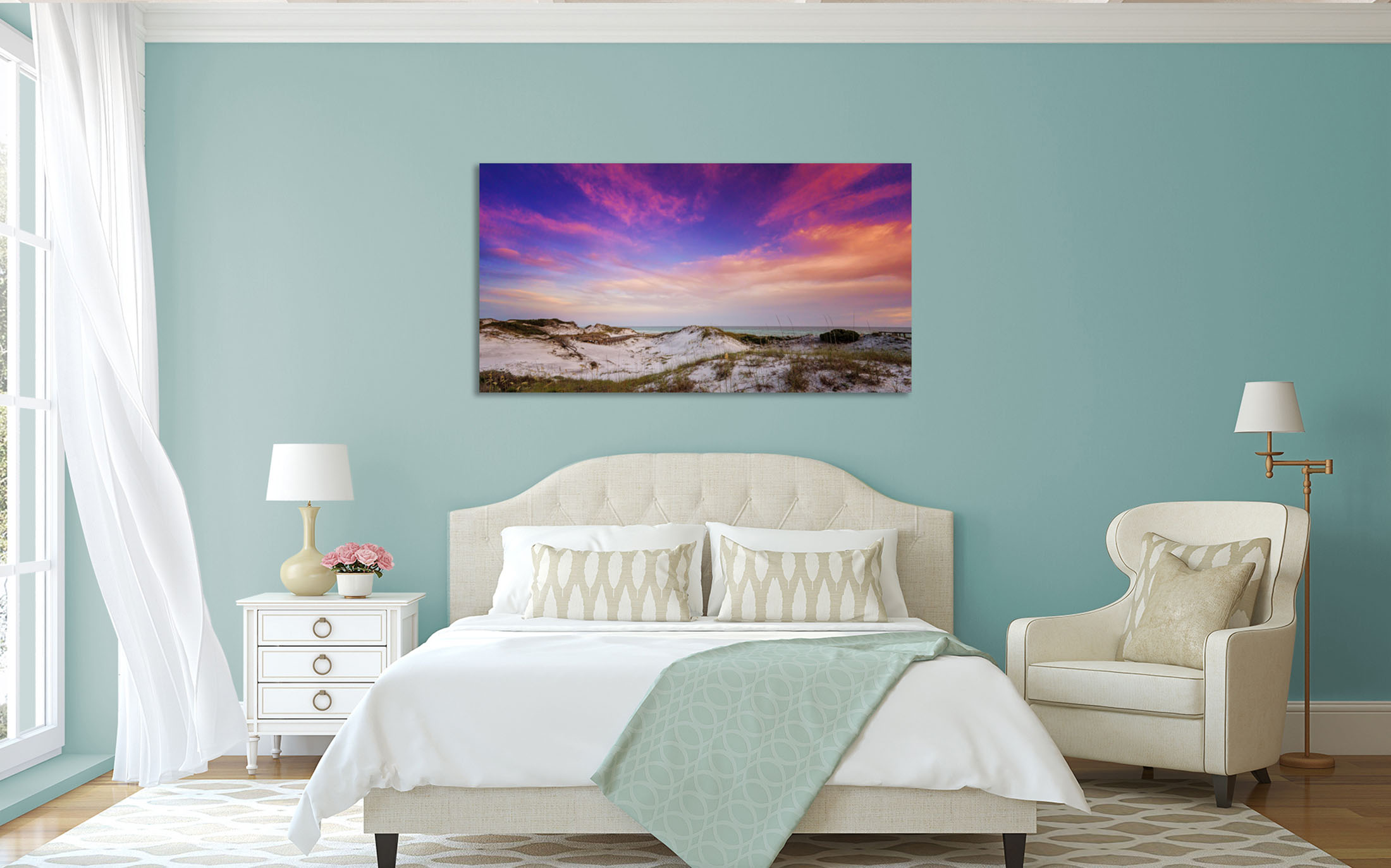 Vacation Rental Decor – 30A Coastal Wall Art Print A coastal sunset dunes print displayed as wall art in a serene blue bedroom — a vacation rental decor example.