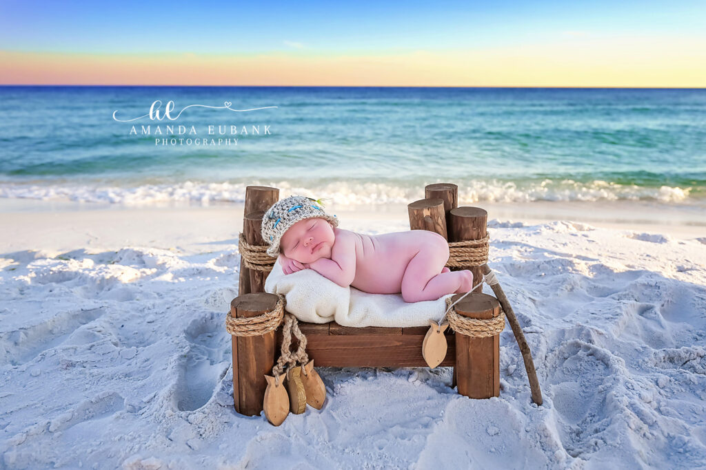 Driftwood bed beach newborn portrait of Baby Ren on the white sand of 30A