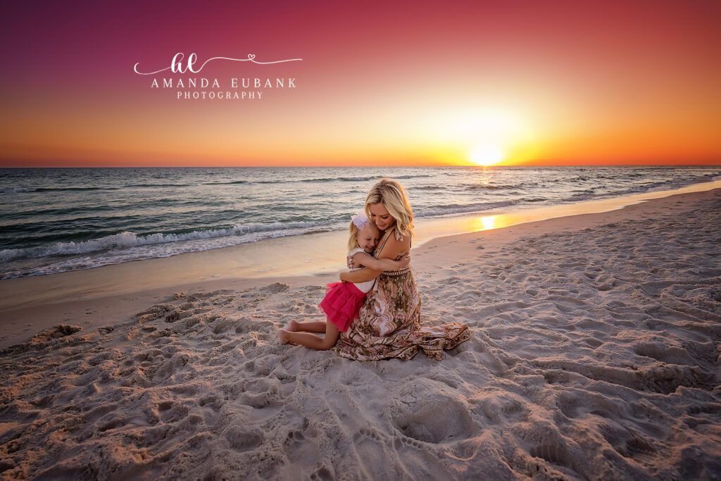 Coral tutu portrait of the H family's youngest daughter standing in the last warm light of the day.
