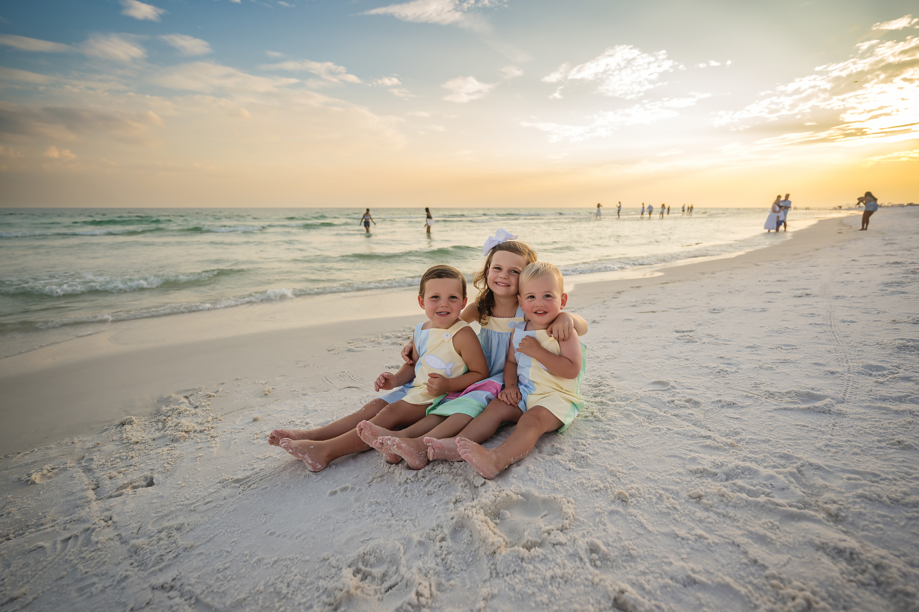 Carter Siblings Destin Sunset Beach Portraits — hugging on white sand at golden hour vol1