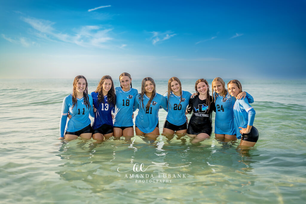 Destin High School Volleyball Beach Portrait 2023 — horizon line behind in the Gulf surf vol1