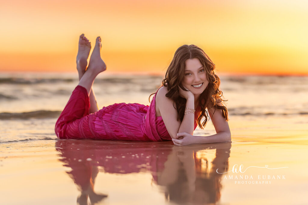 Windswept senior beach portrait at sunset on the Emerald Coast, Seaside FL