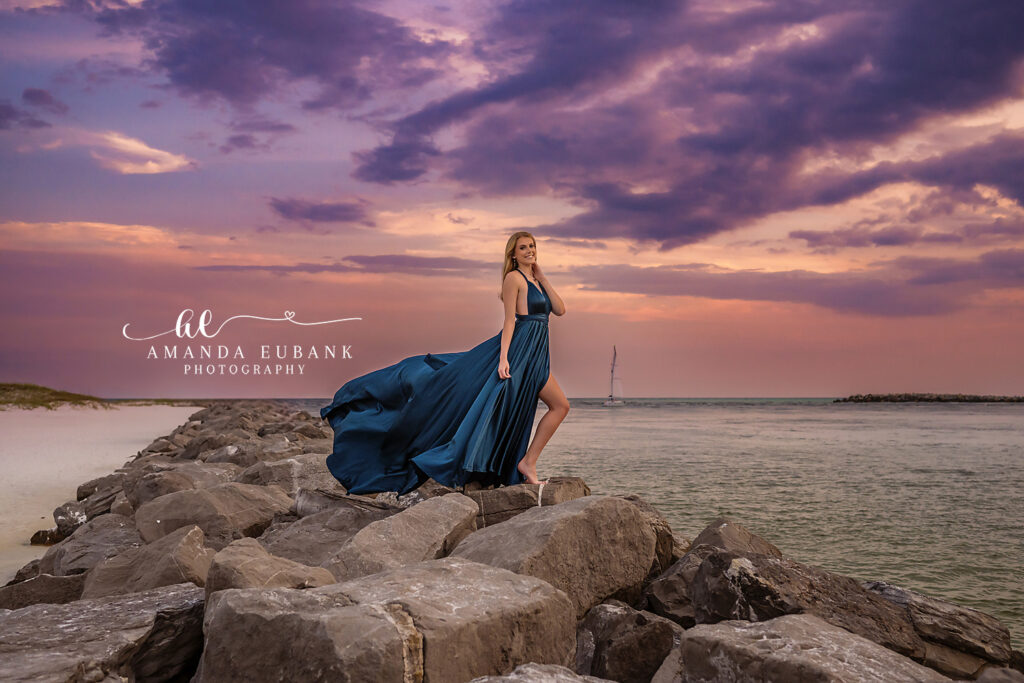 Laughing senior portrait — Miss M in a teal satin Joyfolie dress at Destin sunset