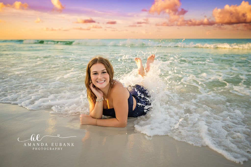 Senior portrait under a painted sky — Miss M glowing at sunrise in Destin