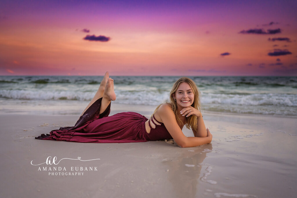 Watercolor sunset senior photographer — Miss S standing on the Watercolor garden bridge