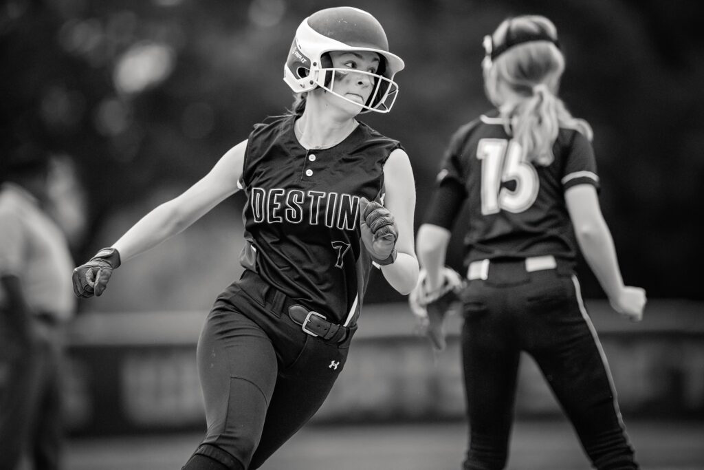 Destin Middle School Softball vs Meigs 2024 — outfield catch in afternoon light vol1