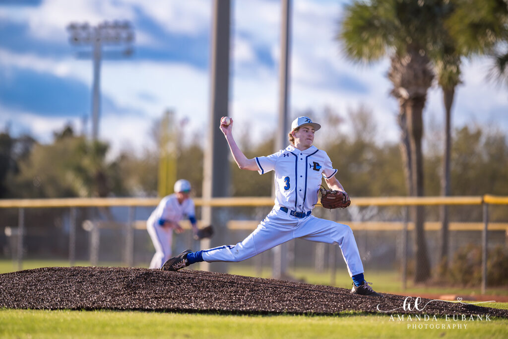Destin High Sharks Baseball March 10 2025 — runner taking lead under stadium lights vol1