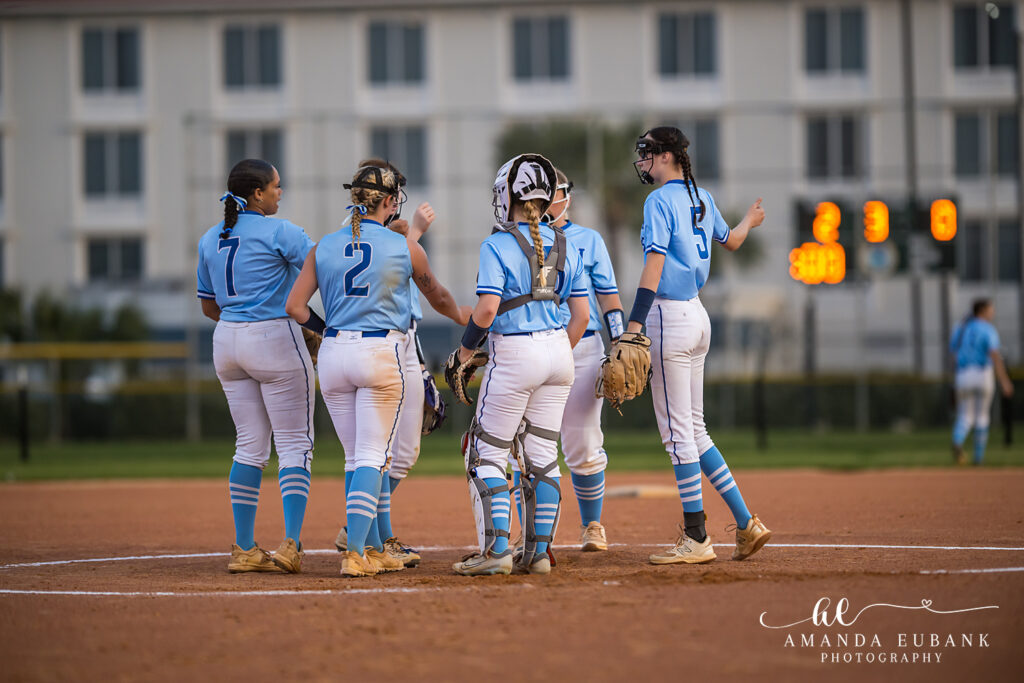 Destin Sharks Softball Pitchers Circle Huddle 2025 — huddle in the pitcher's circle Sharks softball action vol1