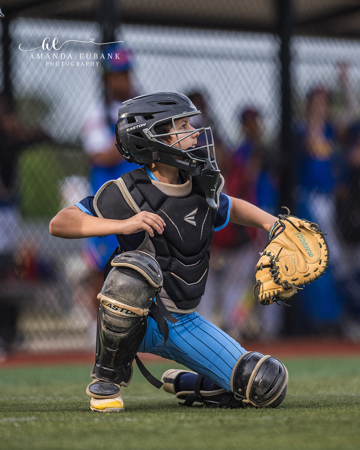 Catcher Ready Crouch with Mitt | Hoover AL Travel Baseball Photographer Power Kilcrease 11U catcher in full Easton gear settles into a low ready crouch with mitt extended during a Hoover, Alabama travel baseball tournament game.