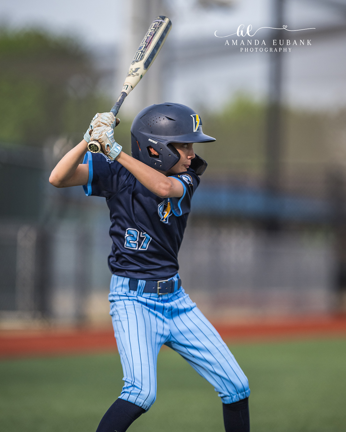 Batter Number 27 Loaded Stance | Hoover AL Travel Baseball Photographer Power Kilcrease 11U batter number 27 stands coiled in his loaded batting stance with bat held high behind his head during a Hoover, Alabama travel baseball tournament game.