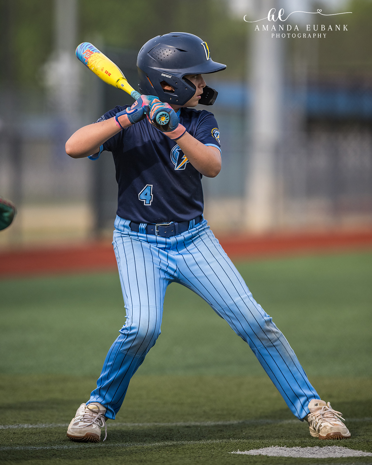 Batter Number 4 Wide Stance | Hoover AL Travel Baseball Photographer Power Kilcrease 11U batter number 4 holds a wide, balanced stance in the box with a yellow and blue bat raised behind his head during a Hoover, Alabama tournament game.