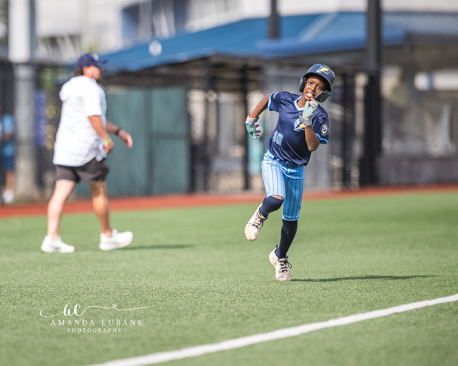 Baserunner Sprint Toward Camera | Hoover AL Travel Baseball Photographer Power Kilcrease 11U baserunner sprints down the baseline directly toward the camera with a coach watching from third base during a Hoover, Alabama tournament game.