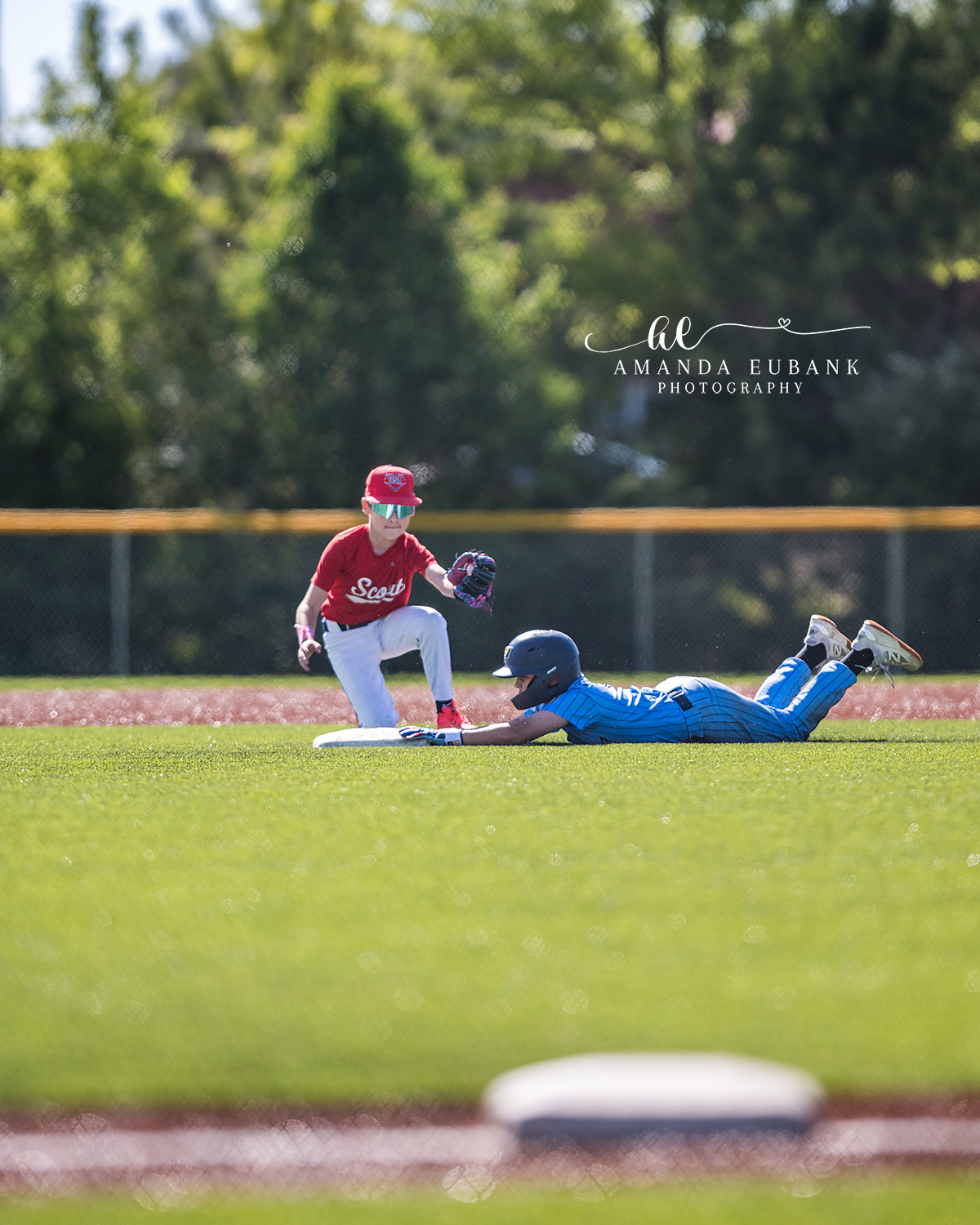 Kilcrease 11U Head-First Slide and Tag Play | Power Baseball Gulf South Hoover AL Kilcrease 11U Power Baseball runner head-first sliding into a base as opposing Stars fielder applies the tag at a Hoover AL tournament