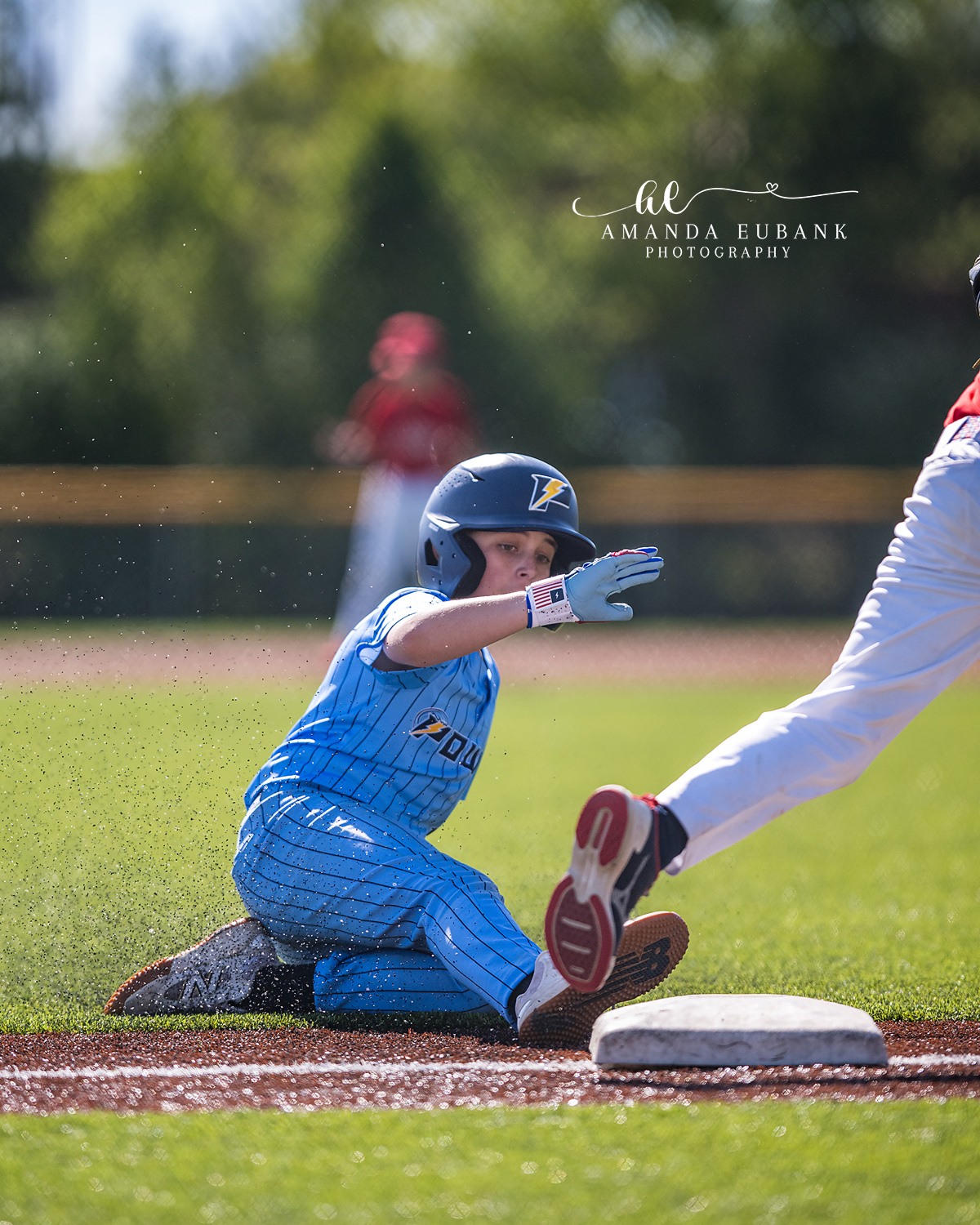 Kilcrease 11U Feet-First Slide into the Bag | Power Baseball Gulf South Hoover AL Kilcrease 11U Power Baseball player feet-first sliding into the bag with American flag batting gloves at a Hoover AL tournament