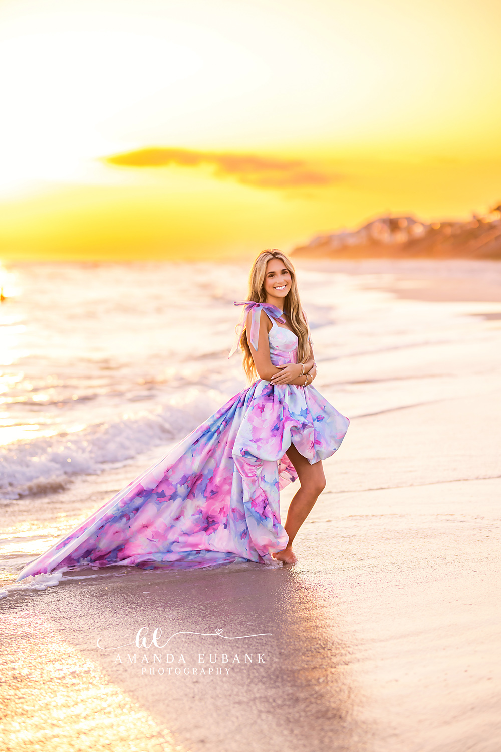 Sunset Beach Walk Senior Portrait | Alys Beach Photographer Senior walking through golden hour surf in a watercolor pastel dress, photographed by Alys Beach Photographer Amanda Eubank.