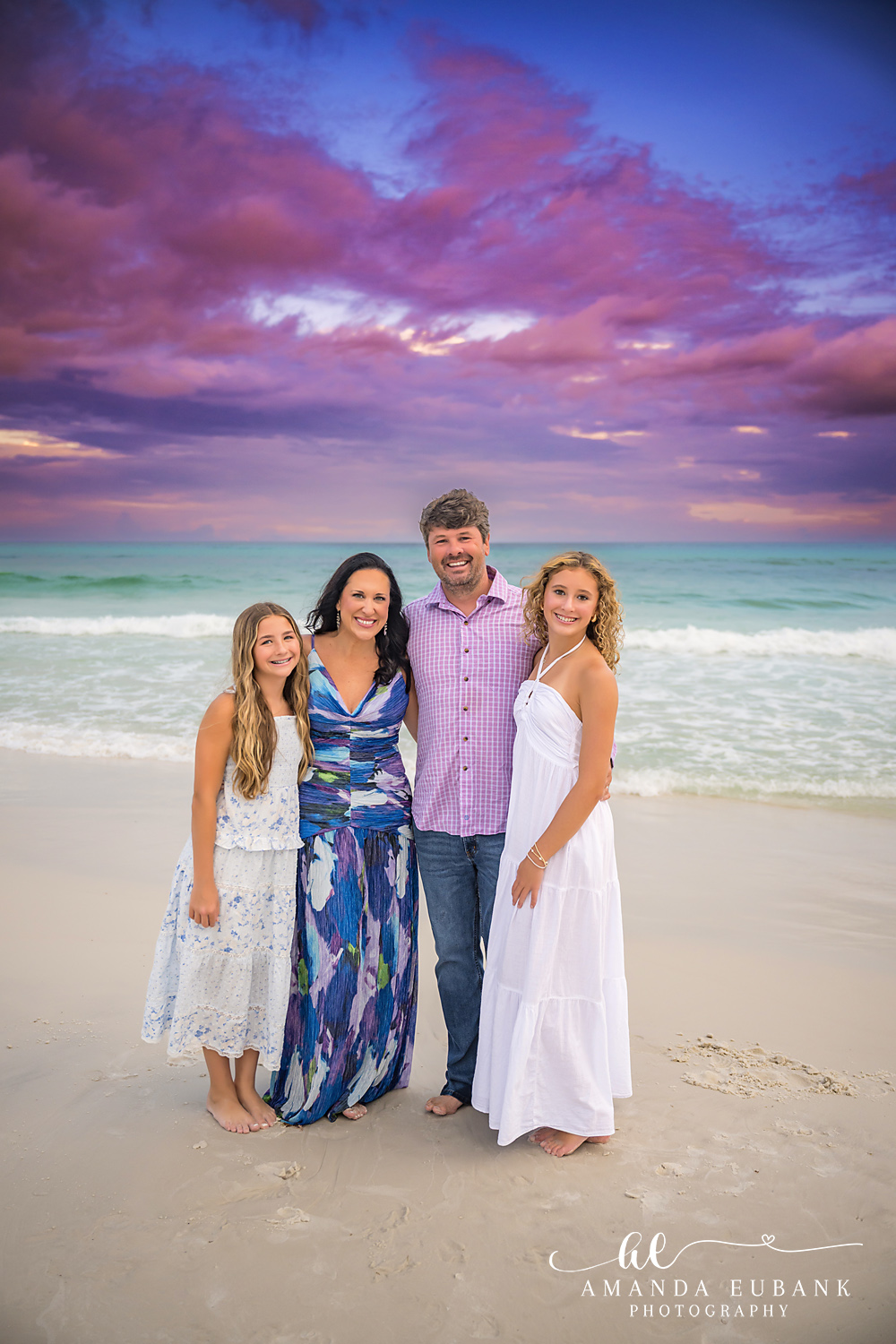 Santa Rosa Beach Family Photographer – Family of Four on 30A Family of four in coordinated blue and white on Seagrove Beach during a 30A sunset session