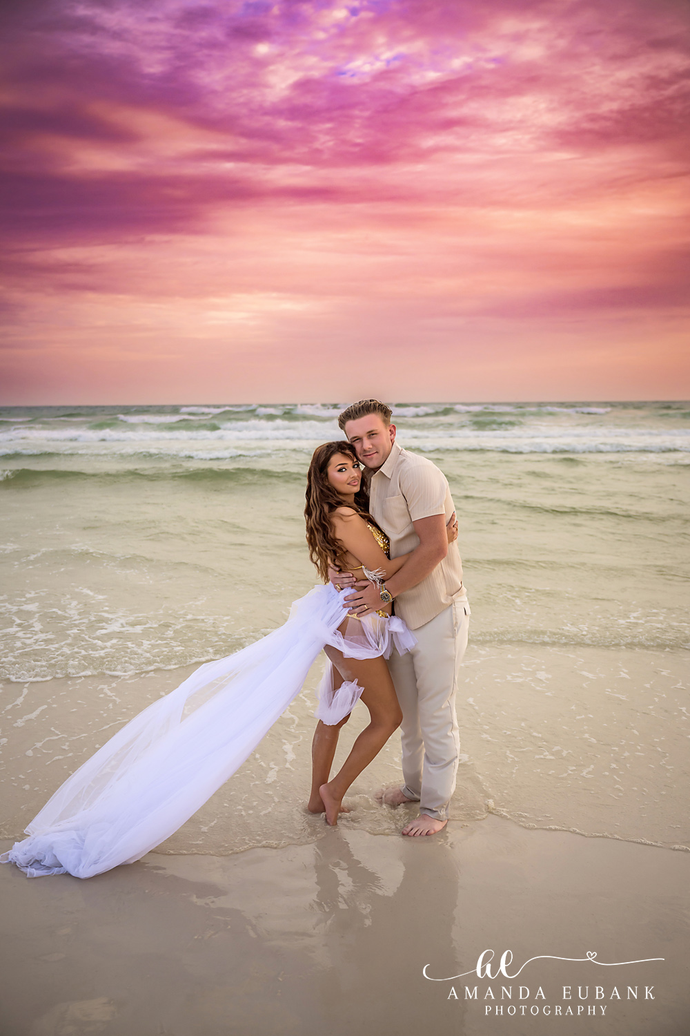 Dune Allen Beach Engagement Photos at Sunset on 30A 30A couples photographer portrait at Dune Allen Beach beneath pink and magenta clouds