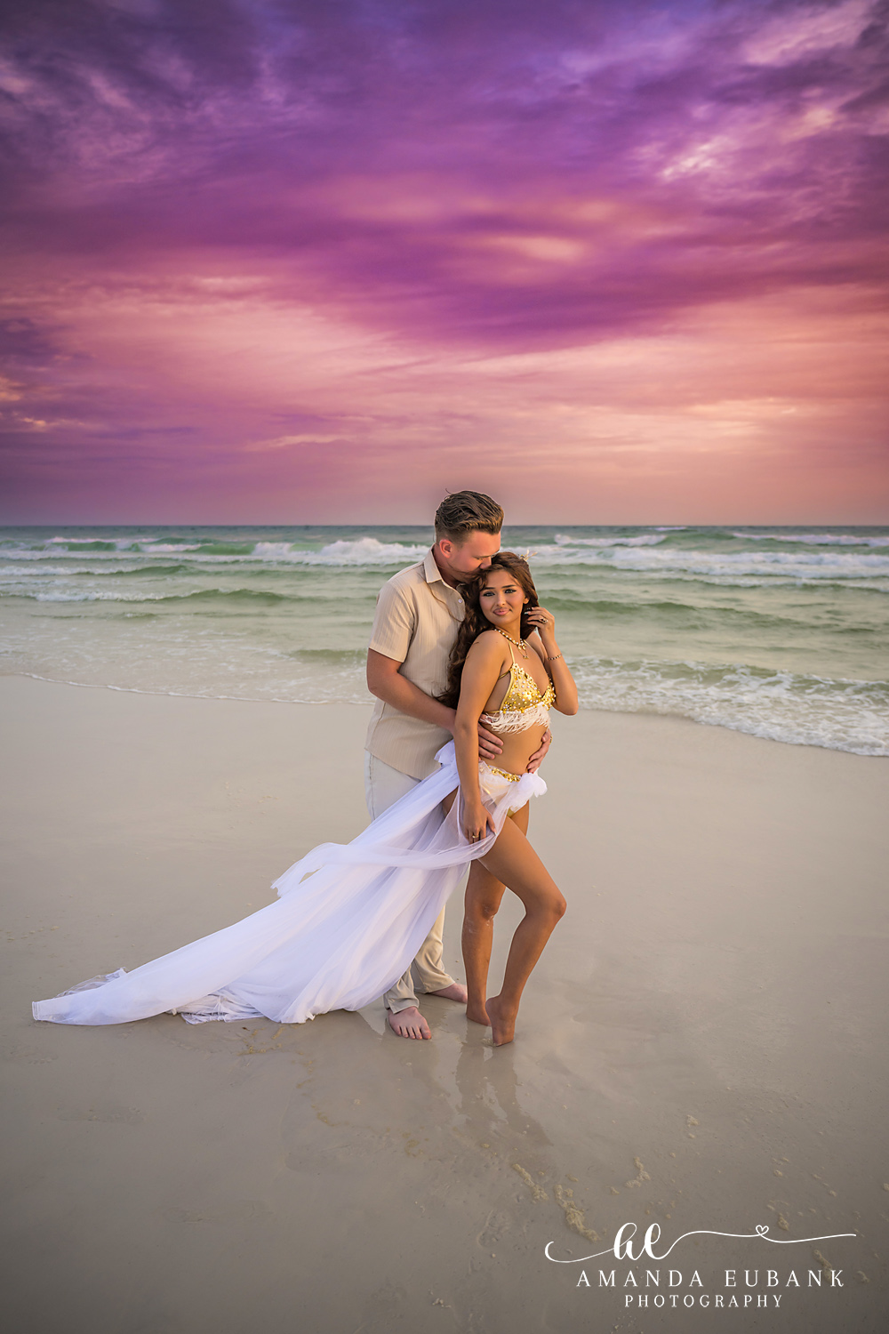 Dune Allen Beach Photographer – Walking the Surf on 30A Wide beach portrait of a couple under a violet 30A sunset with emerald Gulf water behind