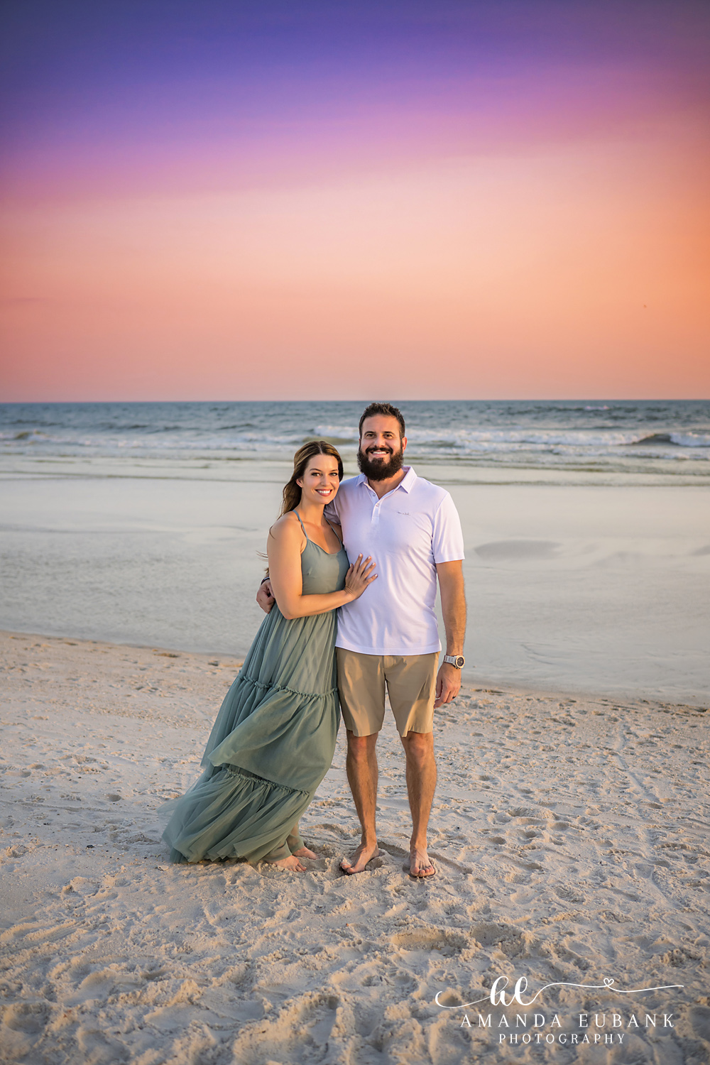 Carillon Beach Photographer – Mom and Dad on the Beach Mother and father standing together on the beach in Carillon Beach, Florida