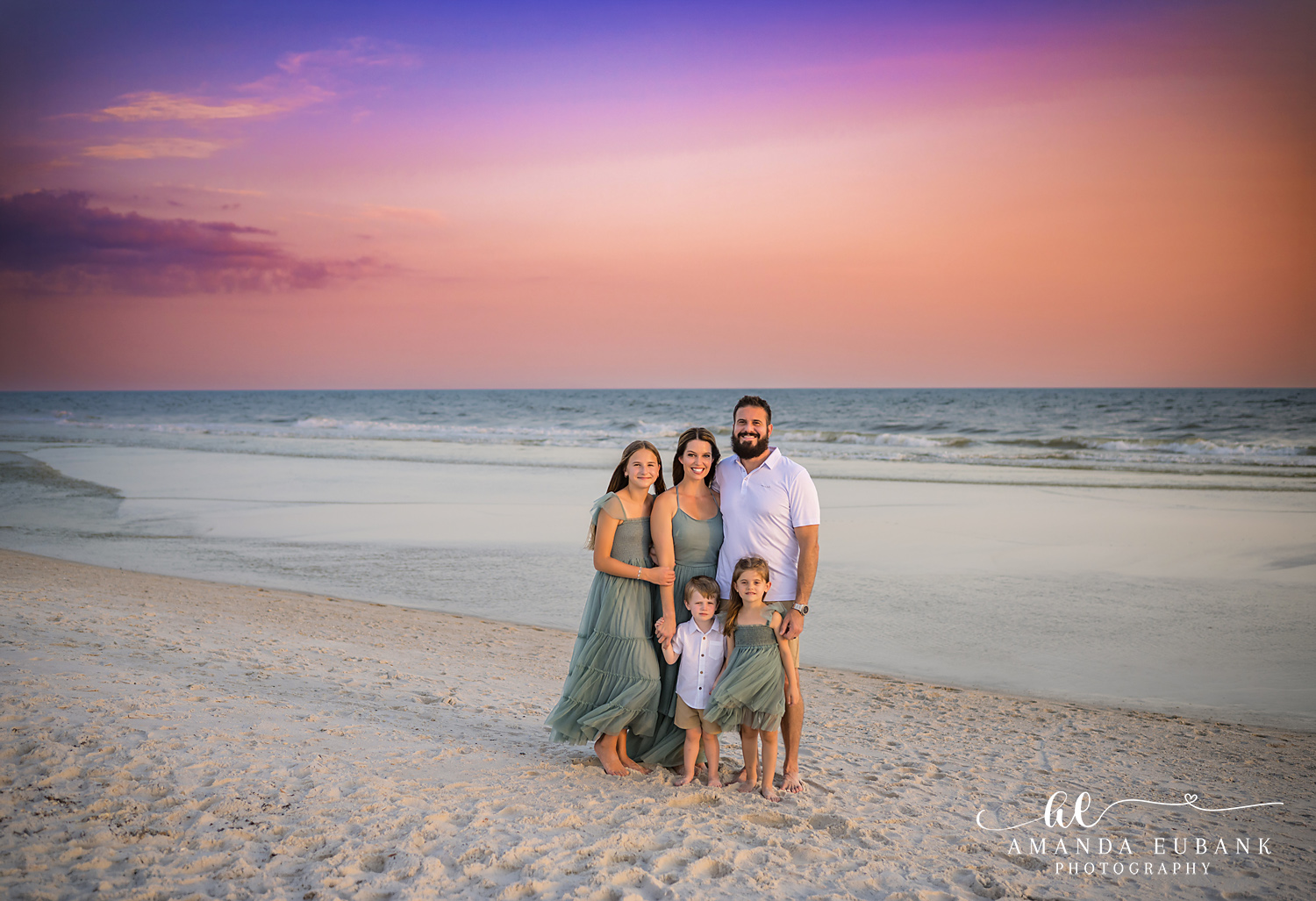 Carillon Beach Photographer – Family Portrait on the Open Beach Family of five standing together on a wide open beach in Carillon Beach, Florida
